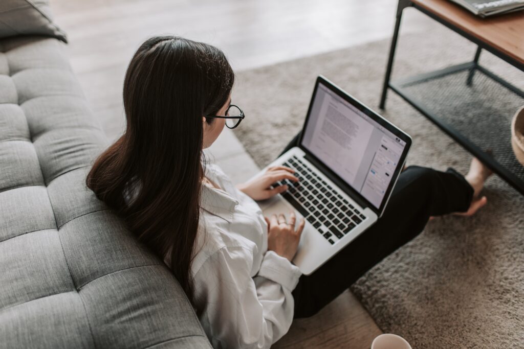 woman writing a grant proposal