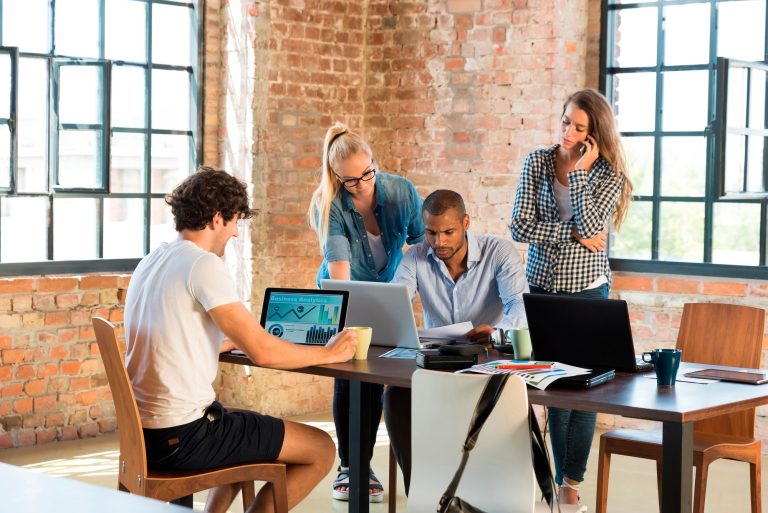 Young business people in office preparing foundation of a start-up company